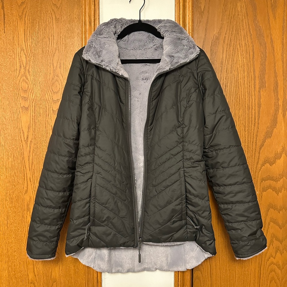 The North Face jacket. Black with VERY soft gray lining.